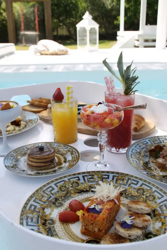 Versace floating tray breakfast inside the jacuzzi